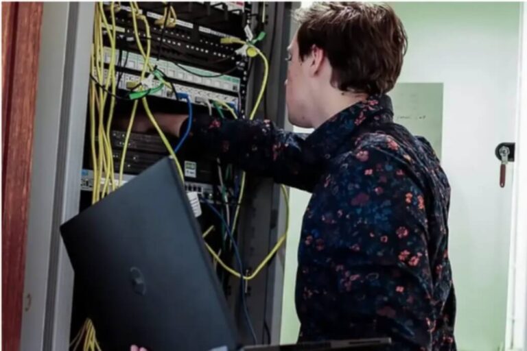 A network enginner working in a server room