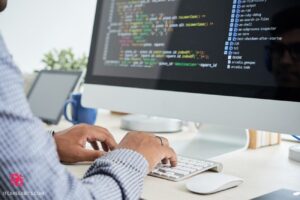 A Software engineer in front of a computer