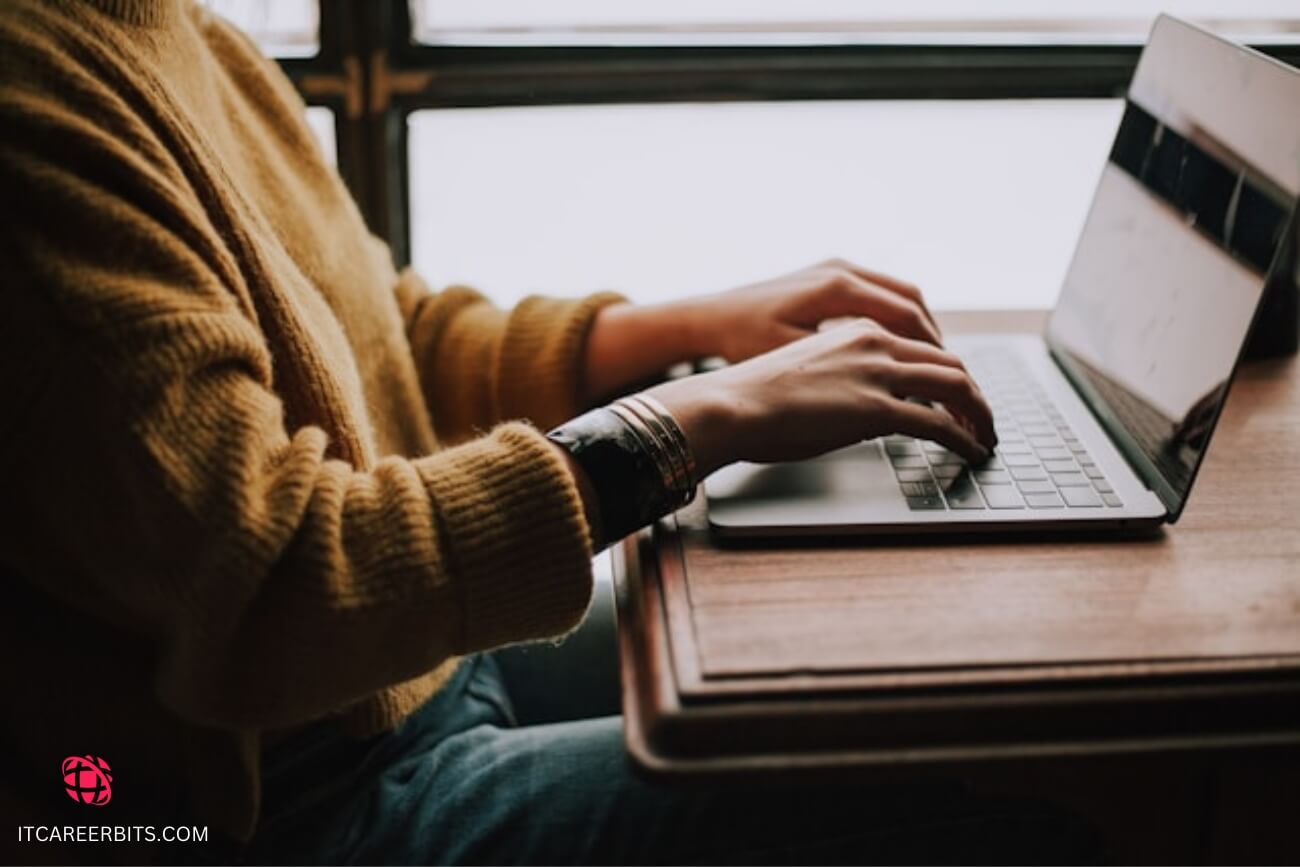 a person typing on a laptop