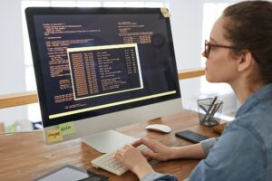 Woman Writing Software Code